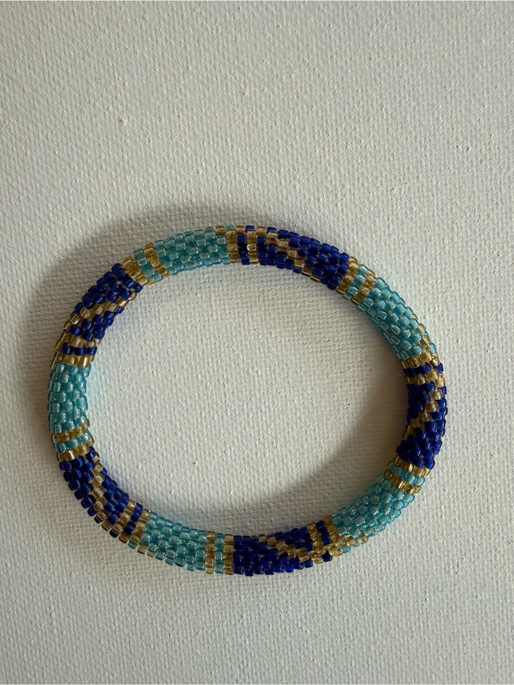 Beaded Stretch Bracelet in Light Blue, Navy and Gold